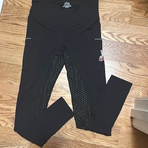NWOT. The ManeRange women’s black leggings. Size L